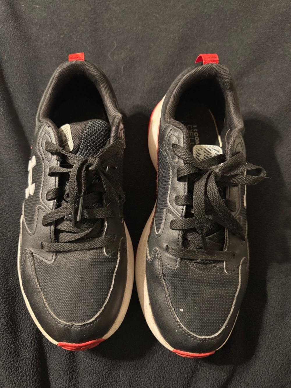 Under Armour Black Sneakers with Red Pull Tabs